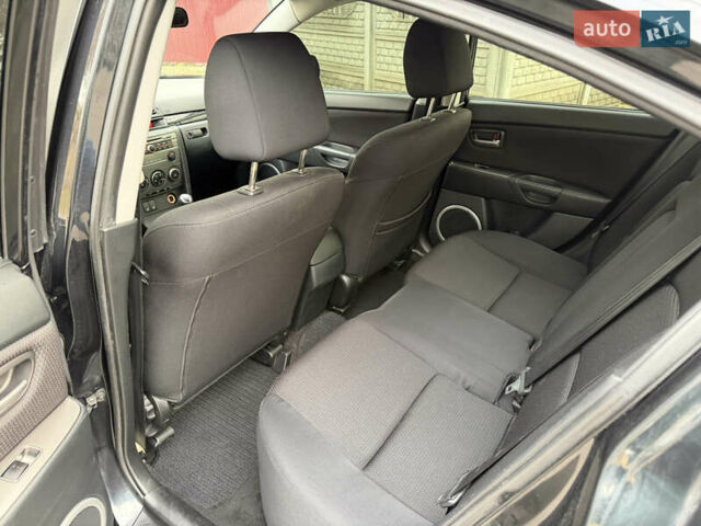 Черный Мазда 3, объемом двигателя 1.6 л и пробегом 189 тыс. км за 4300 $, фото 10 на Automoto.ua