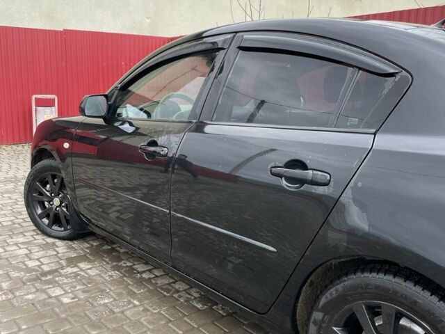 Черный Мазда 3, объемом двигателя 1.6 л и пробегом 189 тыс. км за 4500 $, фото 2 на Automoto.ua