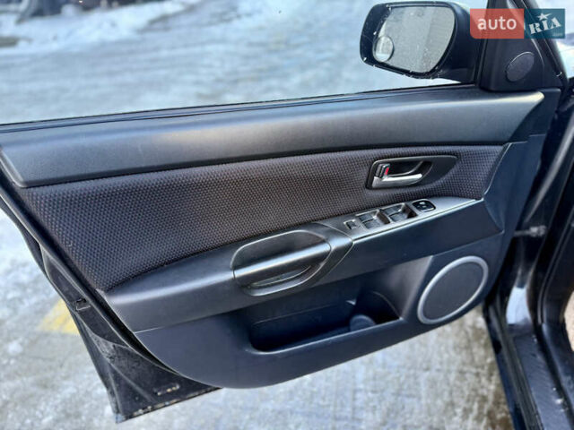 Черный Мазда 3, объемом двигателя 1.6 л и пробегом 210 тыс. км за 3950 $, фото 12 на Automoto.ua