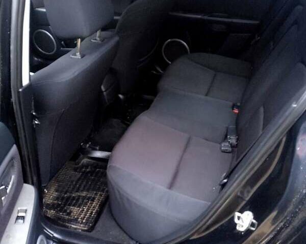 Черный Мазда 3, объемом двигателя 2 л и пробегом 240 тыс. км за 5600 $, фото 17 на Automoto.ua