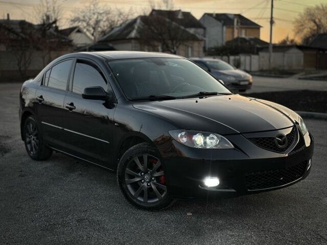 Черный Мазда 3, объемом двигателя 1.6 л и пробегом 290 тыс. км за 4400 $, фото 4 на Automoto.ua