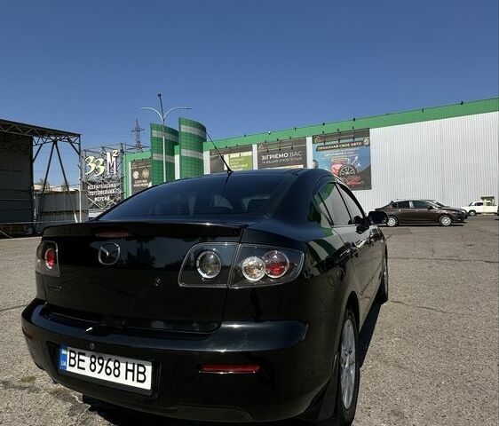 Черный Мазда 3, объемом двигателя 2 л и пробегом 230 тыс. км за 5799 $, фото 6 на Automoto.ua
