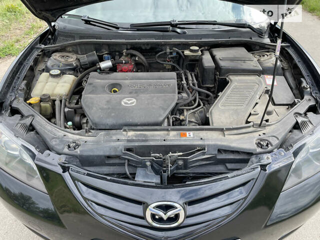 Черный Мазда 3, объемом двигателя 2 л и пробегом 202 тыс. км за 6200 $, фото 18 на Automoto.ua