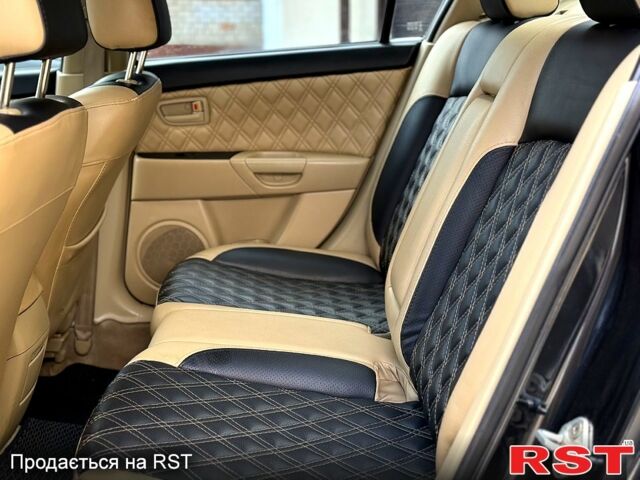 Чорний Мазда 3, об'ємом двигуна 1.6 л та пробігом 268 тис. км за 5750 $, фото 9 на Automoto.ua