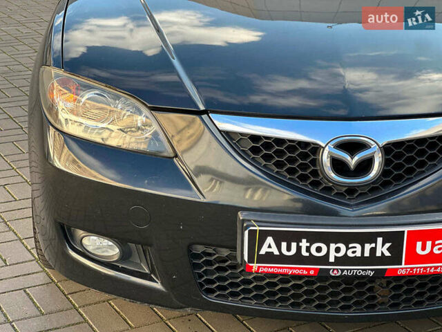 Черный Мазда 3, объемом двигателя 1.6 л и пробегом 232 тыс. км за 6740 $, фото 2 на Automoto.ua