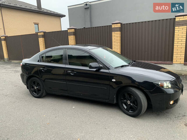 Черный Мазда 3, объемом двигателя 1.6 л и пробегом 200 тыс. км за 4999 $, фото 7 на Automoto.ua