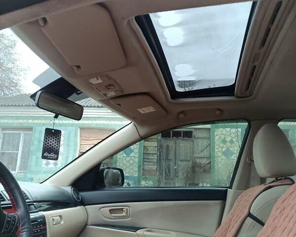 Черный Мазда 3, объемом двигателя 1.6 л и пробегом 232 тыс. км за 5850 $, фото 11 на Automoto.ua