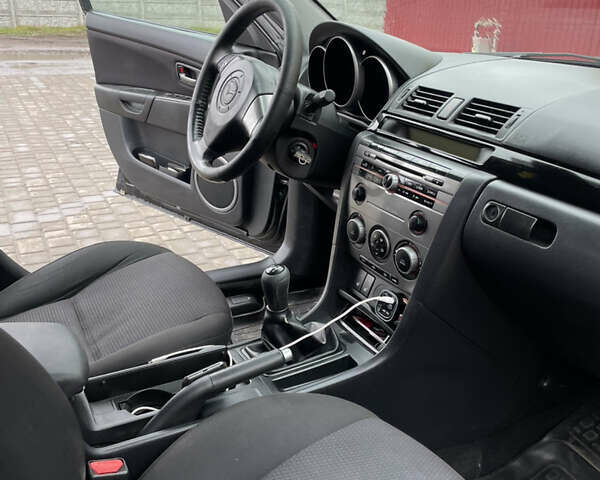 Черный Мазда 3, объемом двигателя 1.6 л и пробегом 189 тыс. км за 4500 $, фото 18 на Automoto.ua