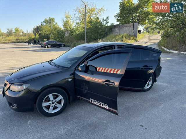 Черный Мазда 3, объемом двигателя 2 л и пробегом 150 тыс. км за 5999 $, фото 27 на Automoto.ua