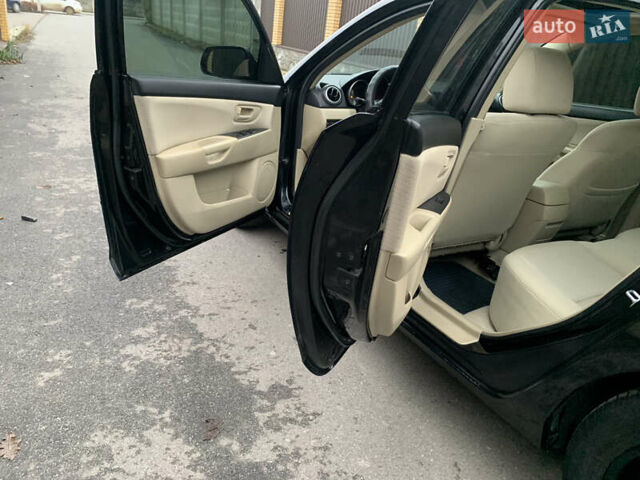 Черный Мазда 3, объемом двигателя 1.6 л и пробегом 200 тыс. км за 4999 $, фото 11 на Automoto.ua