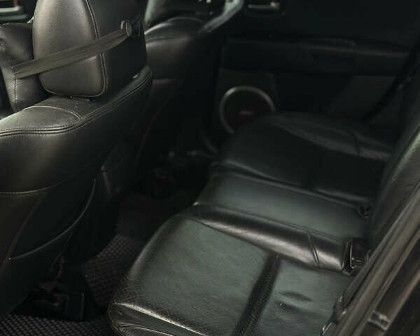 Чорний Мазда 3, об'ємом двигуна 2 л та пробігом 230 тис. км за 6800 $, фото 18 на Automoto.ua