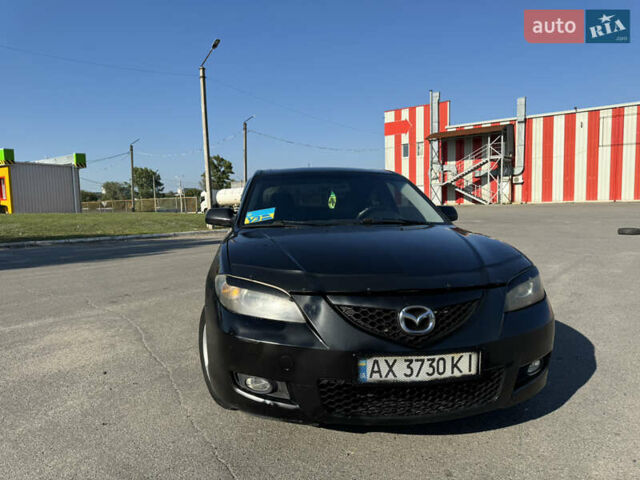 Черный Мазда 3, объемом двигателя 2 л и пробегом 150 тыс. км за 5999 $, фото 9 на Automoto.ua