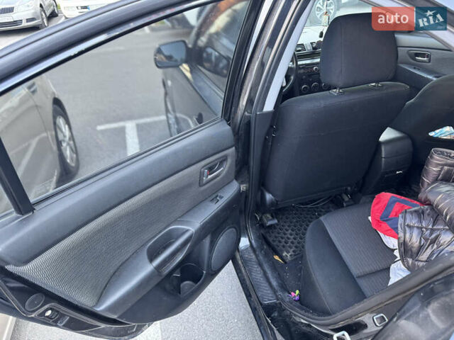 Черный Мазда 3, объемом двигателя 1.6 л и пробегом 350 тыс. км за 4700 $, фото 4 на Automoto.ua