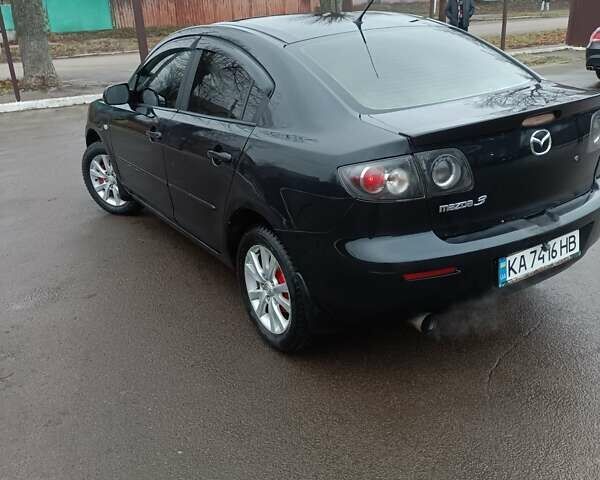 Черный Мазда 3, объемом двигателя 1.6 л и пробегом 232 тыс. км за 5850 $, фото 4 на Automoto.ua