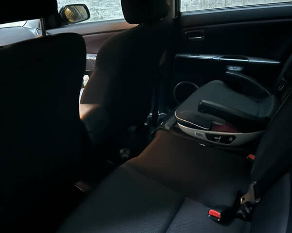 Чорний Мазда 3, об'ємом двигуна 1.6 л та пробігом 177 тис. км за 6100 $, фото 14 на Automoto.ua