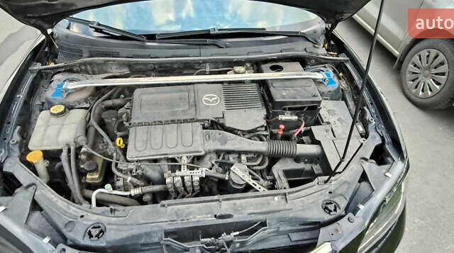 Чорний Мазда 3, об'ємом двигуна 2 л та пробігом 143 тис. км за 5200 $, фото 10 на Automoto.ua