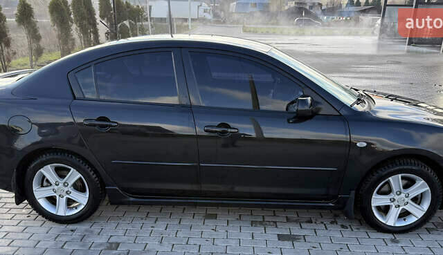 Черный Мазда 3, объемом двигателя 2 л и пробегом 154 тыс. км за 5500 $, фото 3 на Automoto.ua