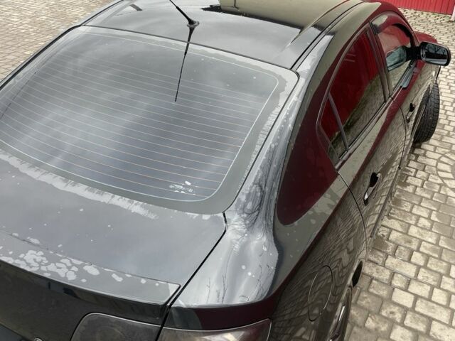 Черный Мазда 3, объемом двигателя 1.6 л и пробегом 189 тыс. км за 4500 $, фото 12 на Automoto.ua