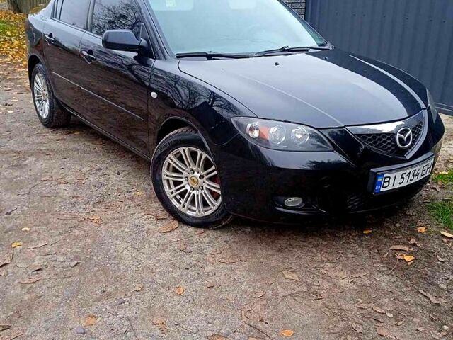 Черный Мазда 3, объемом двигателя 2 л и пробегом 240 тыс. км за 5600 $, фото 2 на Automoto.ua
