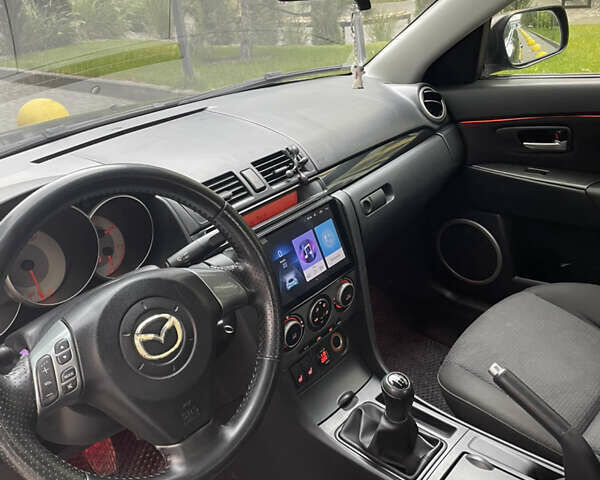 Черный Мазда 3, объемом двигателя 1.6 л и пробегом 206 тыс. км за 6000 $, фото 9 на Automoto.ua