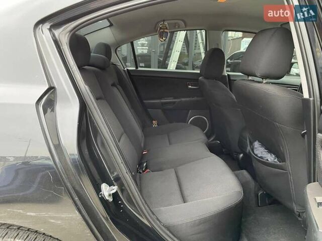 Чорний Мазда 3, об'ємом двигуна 1.6 л та пробігом 223 тис. км за 6490 $, фото 9 на Automoto.ua