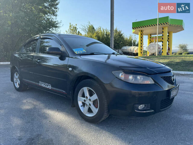 Черный Мазда 3, объемом двигателя 2 л и пробегом 150 тыс. км за 5999 $, фото 17 на Automoto.ua