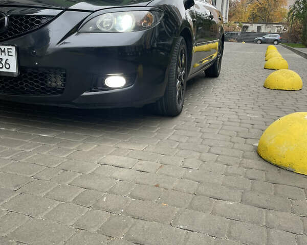 Черный Мазда 3, объемом двигателя 1.6 л и пробегом 206 тыс. км за 6000 $, фото 4 на Automoto.ua
