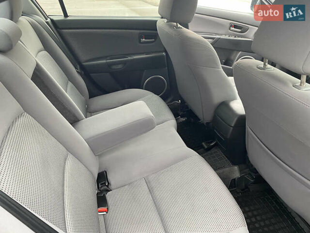 Чорний Мазда 3, об'ємом двигуна 1.6 л та пробігом 188 тис. км за 6800 $, фото 25 на Automoto.ua