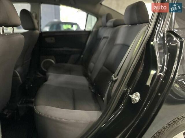 Чорний Мазда 3, об'ємом двигуна 2 л та пробігом 199 тис. км за 7299 $, фото 14 на Automoto.ua