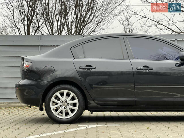 Черный Мазда 3, объемом двигателя 1.6 л и пробегом 256 тыс. км за 5450 $, фото 6 на Automoto.ua