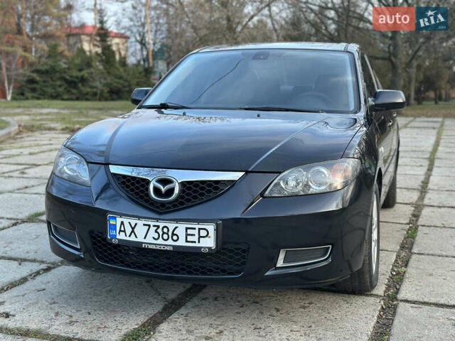 Чорний Мазда 3, об'ємом двигуна 1.6 л та пробігом 198 тис. км за 5499 $, фото 7 на Automoto.ua