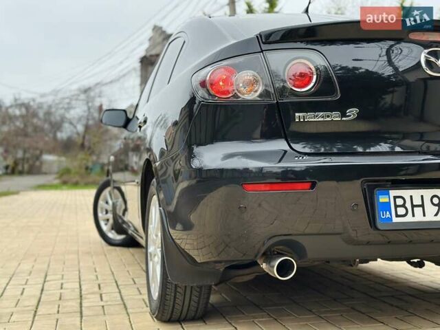 Черный Мазда 3, объемом двигателя 1.6 л и пробегом 130 тыс. км за 7700 $, фото 18 на Automoto.ua