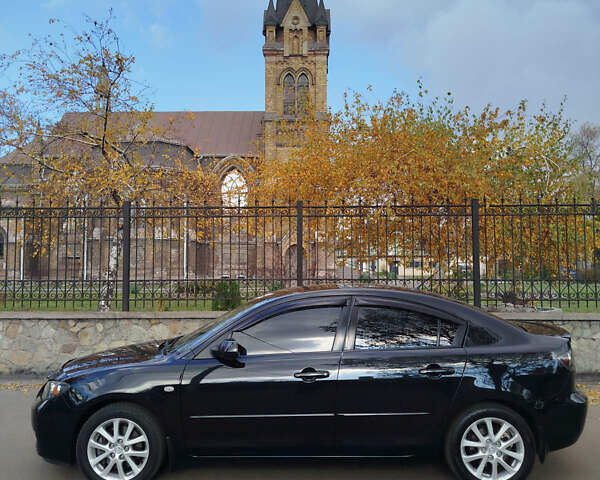 Черный Мазда 3, объемом двигателя 2 л и пробегом 199 тыс. км за 6800 $, фото 2 на Automoto.ua