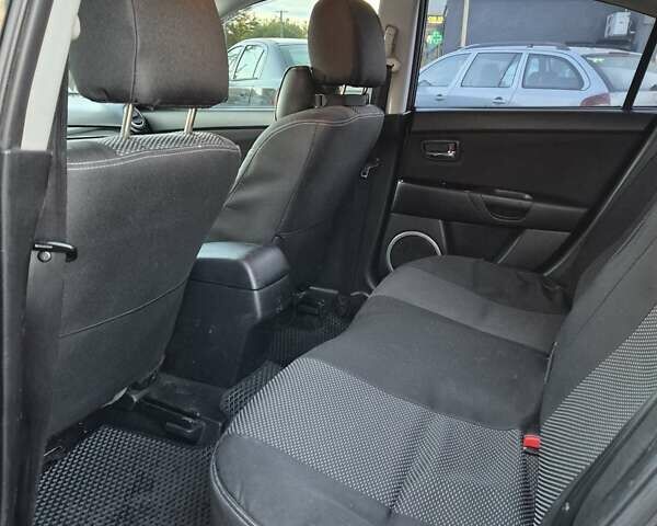 Чорний Мазда 3, об'ємом двигуна 1.6 л та пробігом 253 тис. км за 5200 $, фото 27 на Automoto.ua