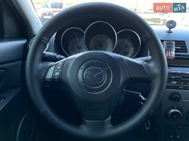 Чорний Мазда 3, об'ємом двигуна 1.6 л та пробігом 281 тис. км за 4990 $, фото 14 на Automoto.ua