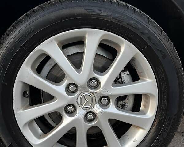 Черный Мазда 3, объемом двигателя 1.6 л и пробегом 153 тыс. км за 6200 $, фото 3 на Automoto.ua