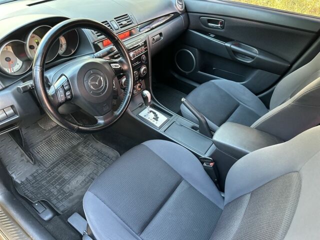 Черный Мазда 3, объемом двигателя 2 л и пробегом 192 тыс. км за 6500 $, фото 2 на Automoto.ua