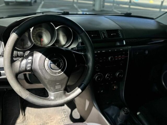 Чорний Мазда 3, об'ємом двигуна 0 л та пробігом 235 тис. км за 5300 $, фото 6 на Automoto.ua