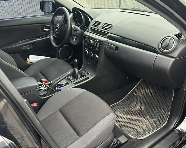 Чорний Мазда 3, об'ємом двигуна 1.6 л та пробігом 135 тис. км за 4900 $, фото 7 на Automoto.ua