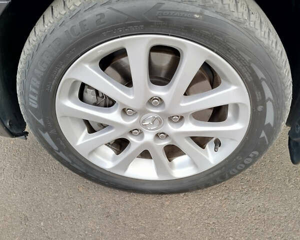 Черный Мазда 3, объемом двигателя 2 л и пробегом 199 тыс. км за 6800 $, фото 13 на Automoto.ua