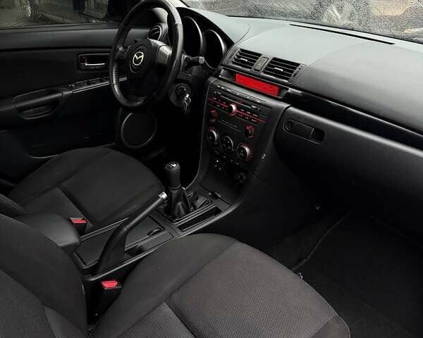 Черный Мазда 3, объемом двигателя 1.6 л и пробегом 89 тыс. км за 4800 $, фото 8 на Automoto.ua
