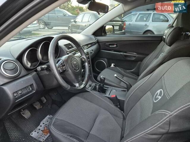 Чорний Мазда 3, об'ємом двигуна 1.6 л та пробігом 253 тис. км за 5200 $, фото 36 на Automoto.ua