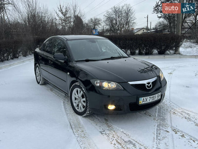 Чорний Мазда 3, об'ємом двигуна 1.6 л та пробігом 196 тис. км за 5500 $, фото 3 на Automoto.ua