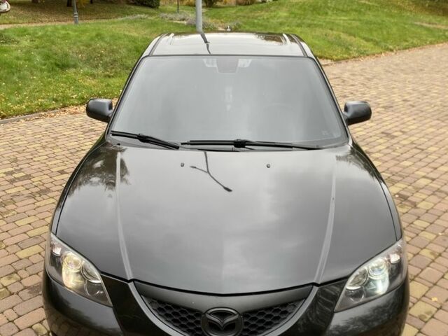 Черный Мазда 3, объемом двигателя 1.6 л и пробегом 228 тыс. км за 6300 $, фото 1 на Automoto.ua