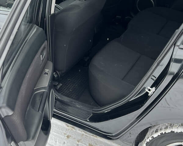 Чорний Мазда 3, об'ємом двигуна 1.6 л та пробігом 196 тис. км за 5500 $, фото 10 на Automoto.ua