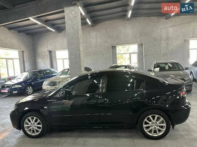 Чорний Мазда 3, об'ємом двигуна 2 л та пробігом 199 тис. км за 7299 $, фото 3 на Automoto.ua