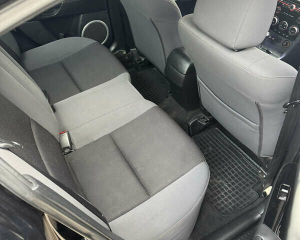 Черный Мазда 3, объемом двигателя 1.6 л и пробегом 255 тыс. км за 5650 $, фото 5 на Automoto.ua