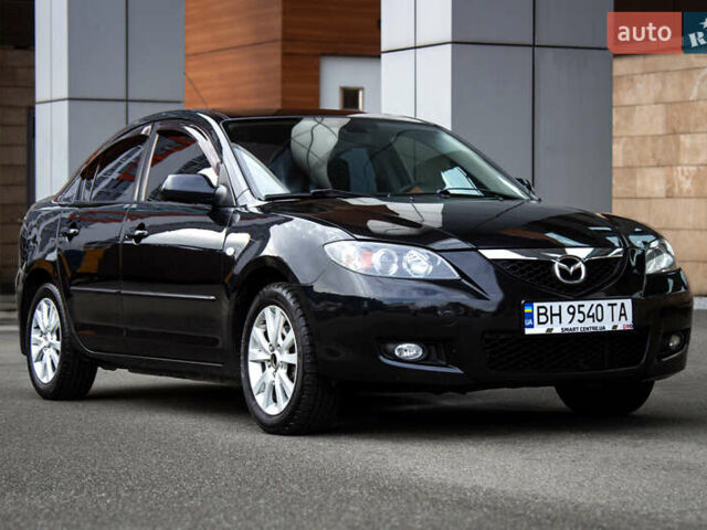 Черный Мазда 3, объемом двигателя 1.6 л и пробегом 185 тыс. км за 6350 $, фото 1 на Automoto.ua