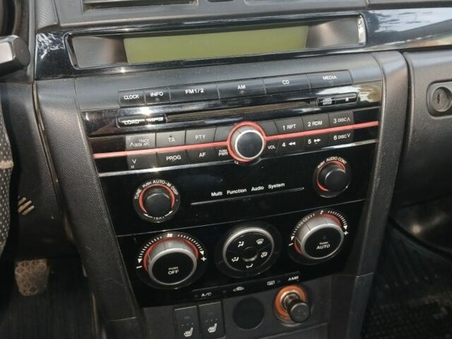 Черный Мазда 3, объемом двигателя 1.6 л и пробегом 245 тыс. км за 3682 $, фото 2 на Automoto.ua