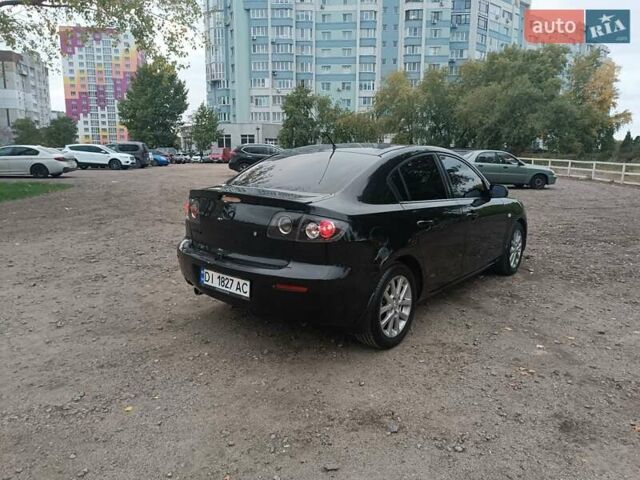Черный Мазда 3, объемом двигателя 2 л и пробегом 221 тыс. км за 5700 $, фото 7 на Automoto.ua